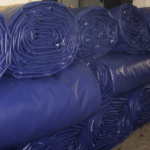Choosing The Right Rollover Replacement Tarps For Industrial Use